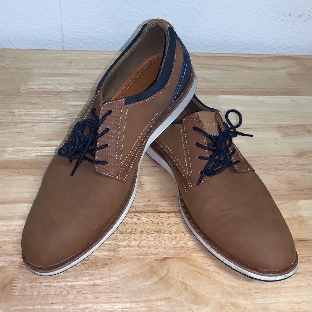 Men brown shoes used just once.